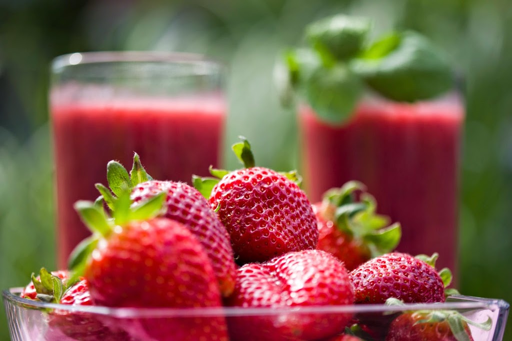 Power drink with strawberries, coconut water, chia seeds and acai powder Power drink with strawberries, coconut water, chia Seeds and acai powder