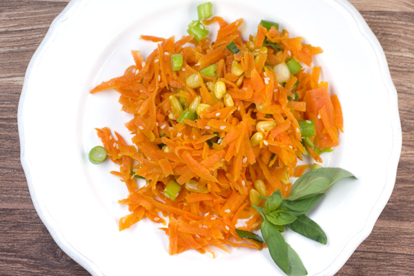 Spicy carrot salad with pine nuts and chili