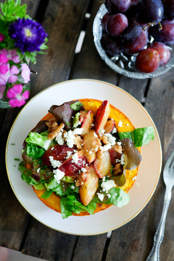 Caramelized plum salad in pumpkin