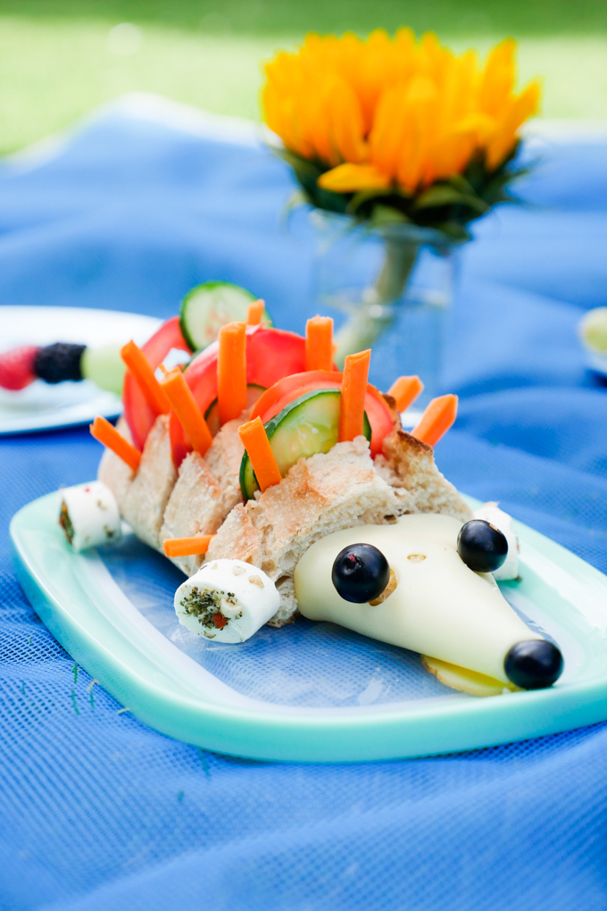  Cheese urchin with baguette, tomatoes, cucumbers and cheese 
