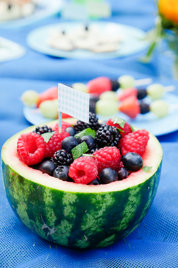 Fruit salad in the watermelon for the healthy kid's picnic